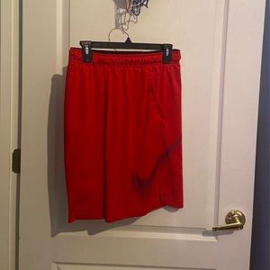 Red Nike shorts